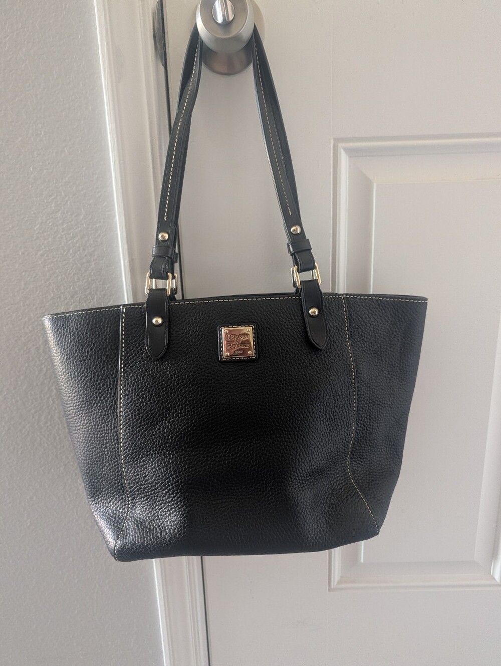 Dooney & Bourke Black Leather Tote Handbag with Gold Plaque